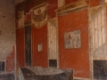 Muurschildering rijkversierd en pomeiaans rood